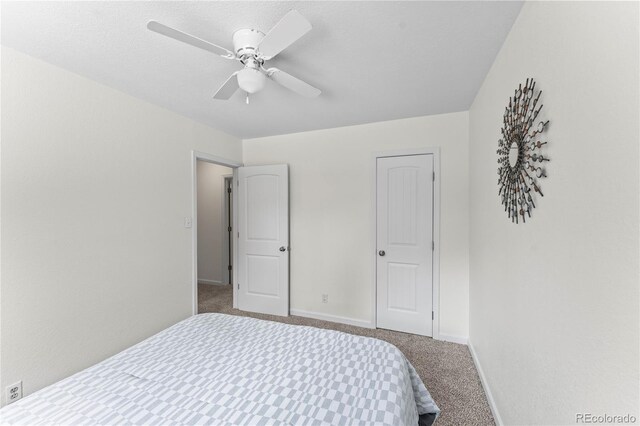 134 Hayes Dr, Colorado Springs, CO 80911 - carpeted bedroom with baseboards and ceiling fan
