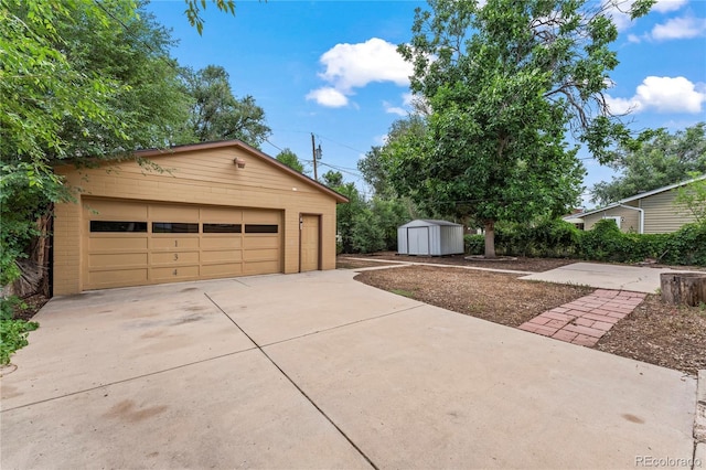 134 Hayes Dr, Colorado Springs, CO 80911 - detached garage featuring a shed