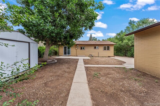 134 Hayes Dr, Colorado Springs, CO 80911 - view of yard with a patio and a shed