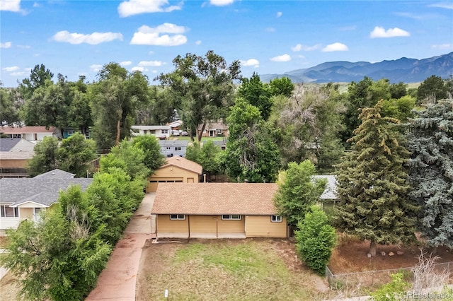 134 Hayes Dr, Colorado Springs, CO 80911 - aerial view of residential area featuring a mountainous background