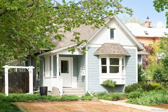 539 Baker St, Longmont, CO 80501 - view of front of house with roof with shingles and fence