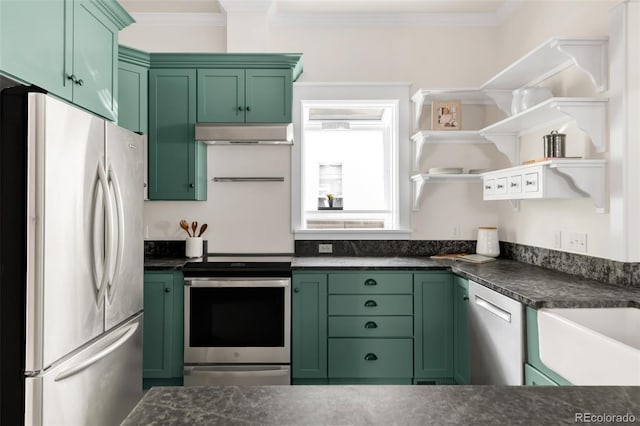 539 Baker St, Longmont, CO 80501 - kitchen featuring stainless steel appliances, green cabinets, open shelves, crown molding, and dark countertops