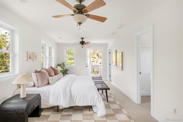 539 Baker St, Longmont, CO 80501 - bedroom with light colored carpet, baseboards, and a ceiling fan