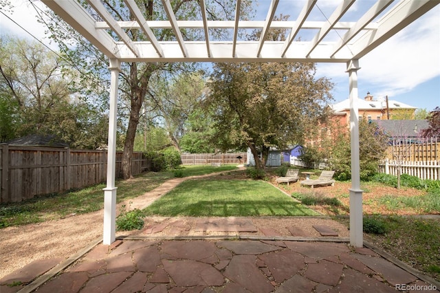 539 Baker St, Longmont, CO 80501 - view of yard with a pergola, a patio, an outbuilding, and a storage shed