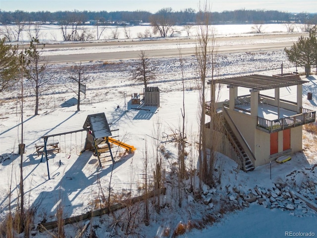 view of dock featuring a rural view and a playground