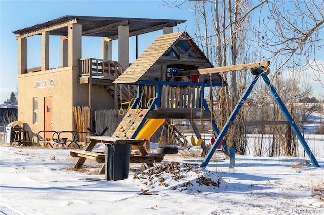 view of snow covered playground