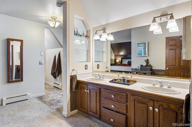 bathroom with baseboard heating, lofted ceiling, and vanity