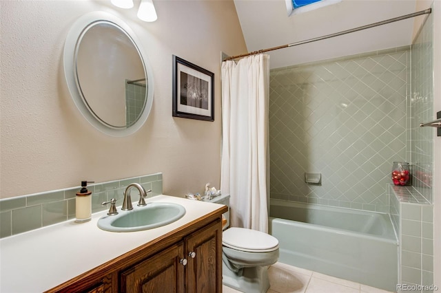 full bathroom featuring vanity, shower / bath combo, tile patterned floors, and toilet