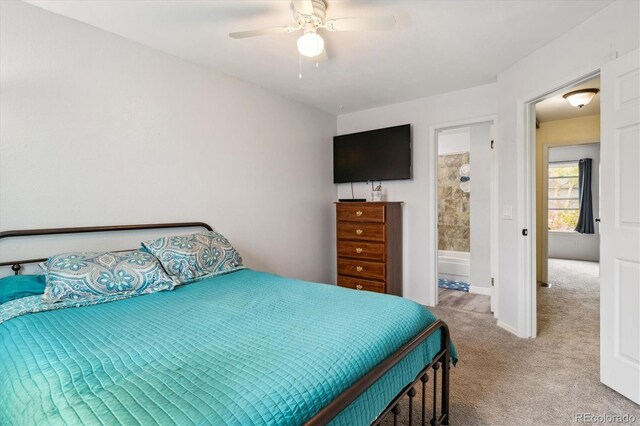carpeted bedroom with baseboards and a ceiling fan