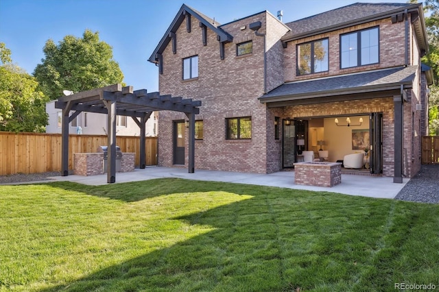 back of property featuring area for grilling, a yard, a pergola, and a patio