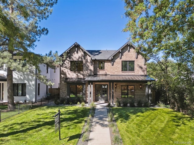 view of front of house with a front lawn