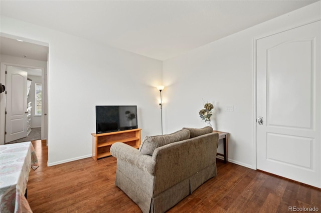 living room featuring dark hardwood / wood-style floors