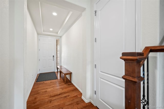 corridor featuring wood-type flooring