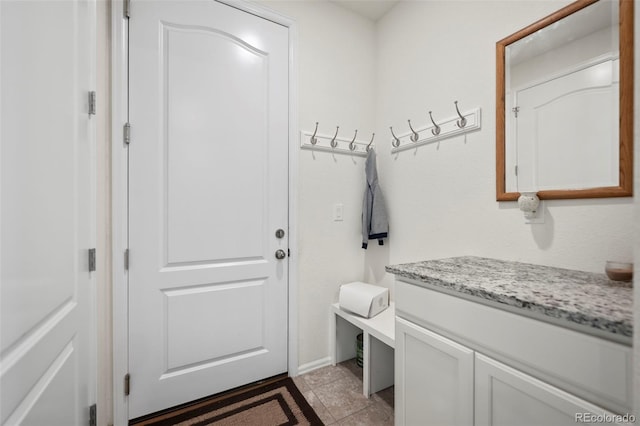 mudroom featuring light tile patterned floors