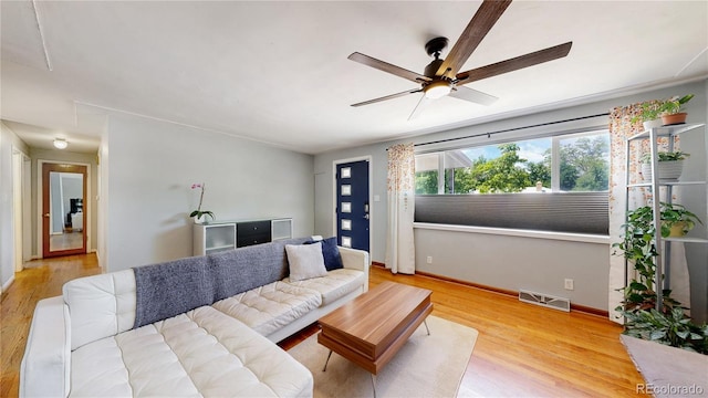 8774 Princeton St, Westminster, CO 80031 - living room featuring ceiling fan, wood finished floors, and baseboards