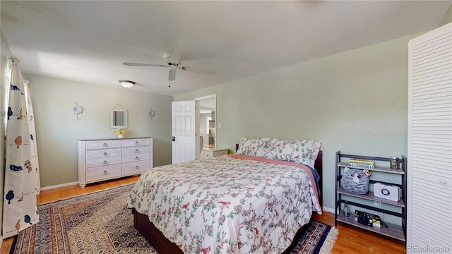 8774 Princeton St, Westminster, CO 80031 - bedroom featuring wood finished floors, baseboards, and a ceiling fan