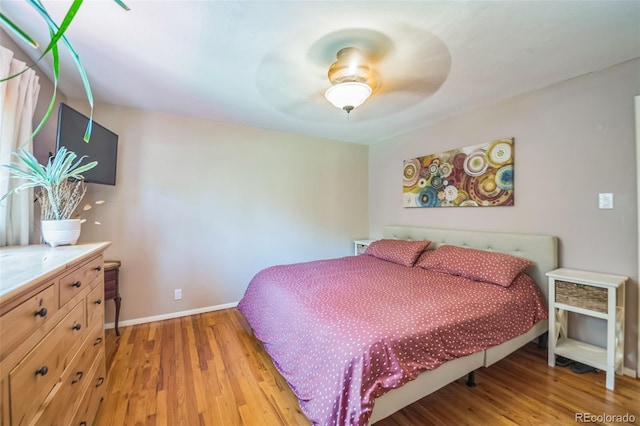 570 Columbine Ave, Golden, CO 80401 - bedroom with light wood-type flooring and a ceiling fan