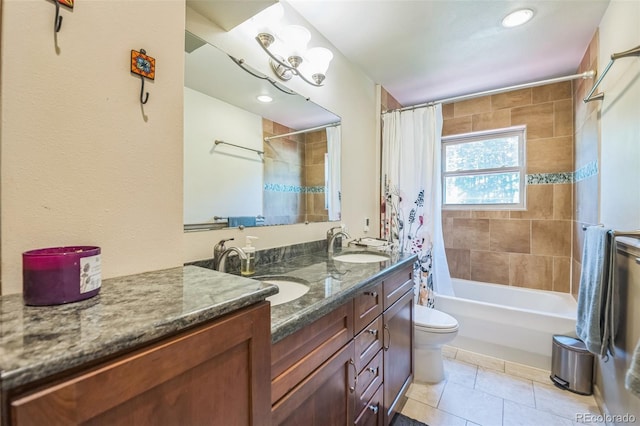 570 Columbine Ave, Golden, CO 80401 - full bathroom featuring shower / tub combo, double vanity, and tile patterned flooring