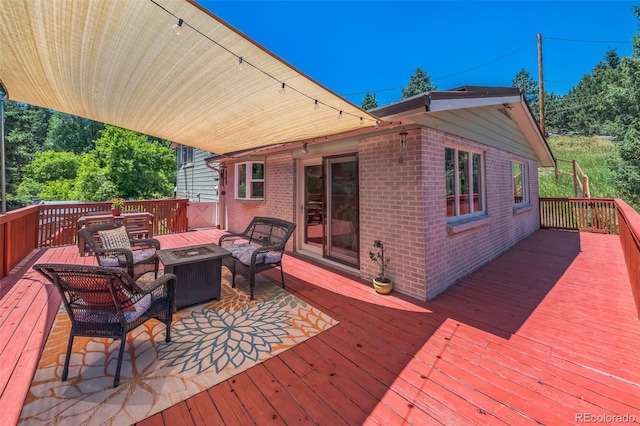 570 Columbine Ave, Golden, CO 80401 - wooden deck with a fire pit