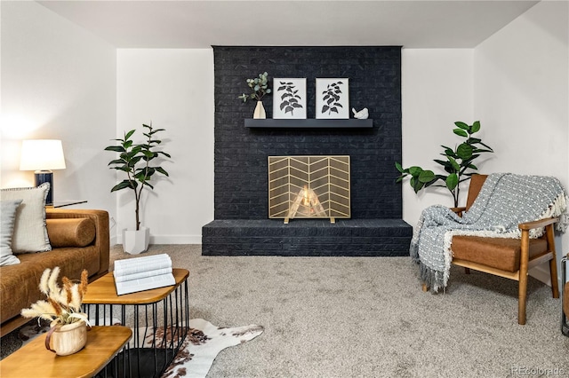 carpeted living room featuring a brick fireplace