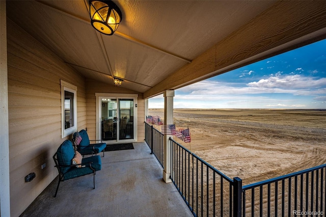 view of patio with a balcony