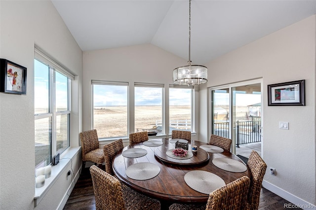 4820 S County Road 137, Bennett, CO 80102 - dining space featuring a chandelier, dark wood-type flooring, lofted ceiling, baseboards, and a textured wall