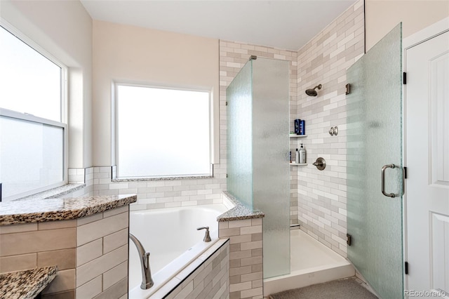4820 S County Road 137, Bennett, CO 80102 - bathroom with a shower stall and a bath