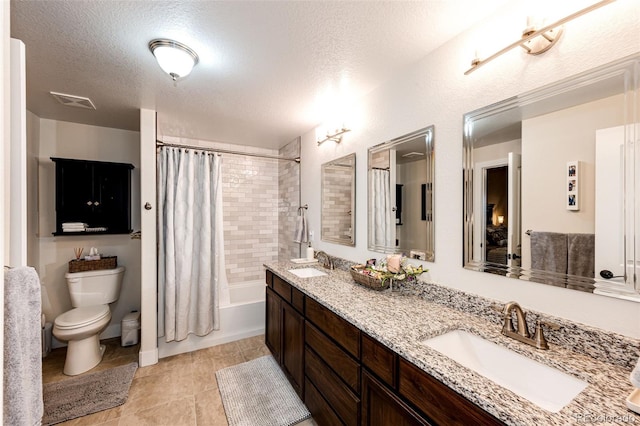 4820 S County Road 137, Bennett, CO 80102 - bathroom with toilet, a textured ceiling, shower / tub combo with curtain, double vanity, and tile patterned flooring