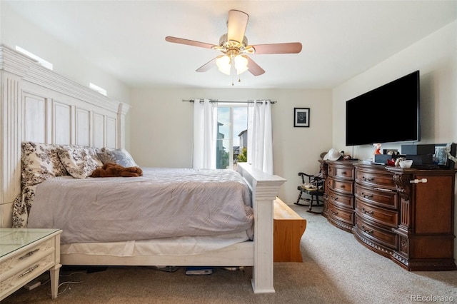 bedroom with ceiling fan and carpet flooring