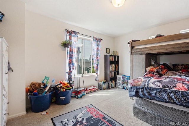 bedroom featuring carpet