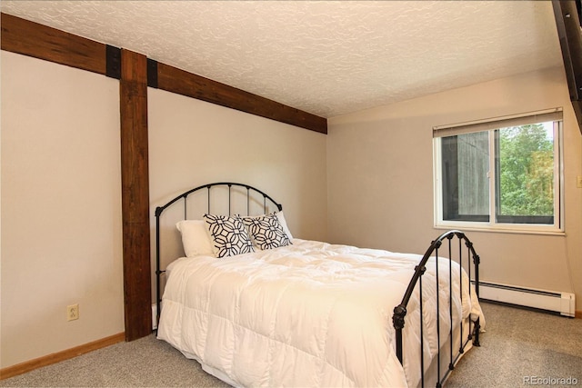 101 Ryan Gulch Ct Unit A202, Silverthorne, CO 80498 - carpeted bedroom featuring a textured ceiling and a baseboard radiator