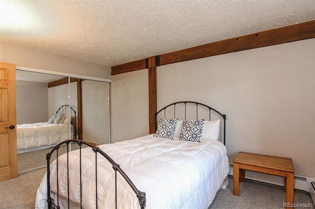 101 Ryan Gulch Ct Unit A202, Silverthorne, CO 80498 - bedroom with carpet floors, a closet, and a textured ceiling