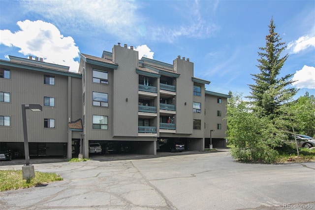 101 Ryan Gulch Ct Unit A202, Silverthorne, CO 80498 - view of property with uncovered parking