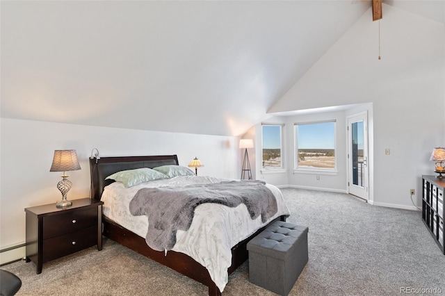 bedroom with lofted ceiling with beams, baseboard heating, carpet flooring, and baseboards