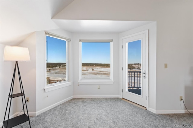 interior space featuring baseboards