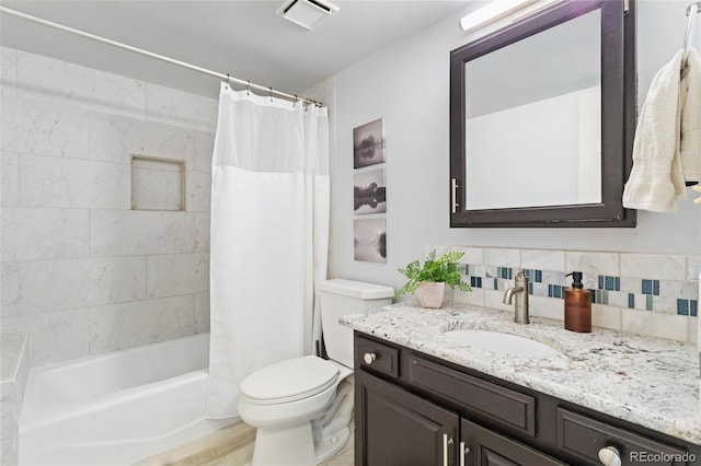 bathroom featuring visible vents, decorative backsplash, toilet, shower / bathtub combination with curtain, and vanity