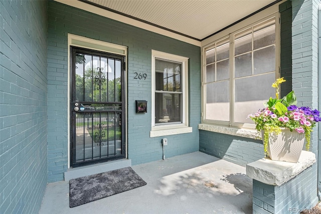 269 Delaware St, Denver, CO 80223 - entrance to property with a porch and brick siding