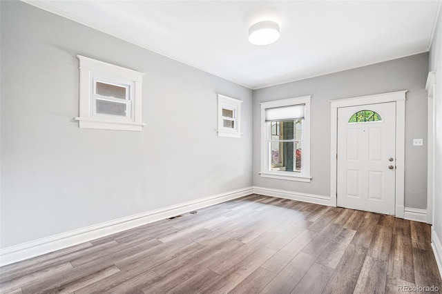 269 Delaware St, Denver, CO 80223 - foyer with wood finished floors and ornamental molding