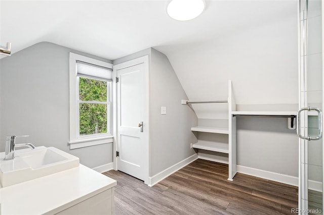 269 Delaware St, Denver, CO 80223 - laundry area with a sink and wood finished floors