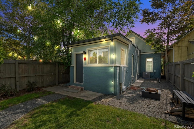269 Delaware St, Denver, CO 80223 - view of outdoor structure with an outdoor fire pit and a fenced backyard