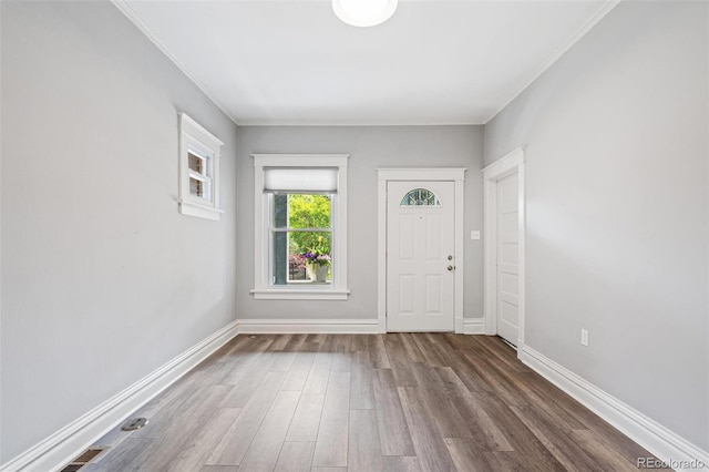 269 Delaware St, Denver, CO 80223 - entrance foyer with wood finished floors and crown molding