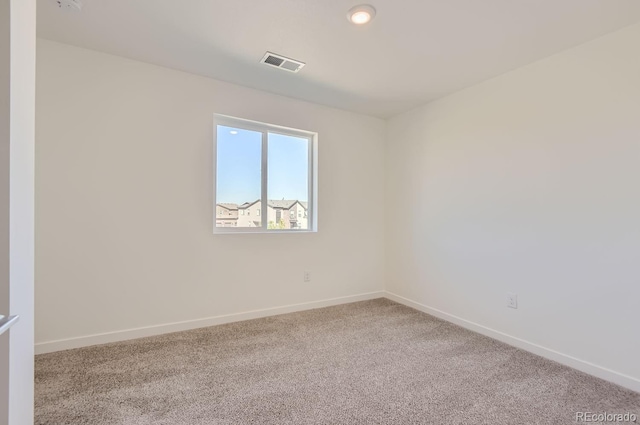 empty room with carpet floors