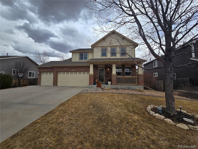 view of front of home with brick siding, a porch, an attached garage, fence, and driveway