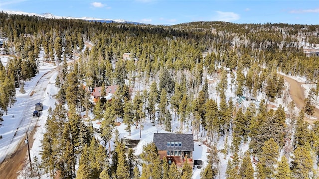 bird's eye view featuring a mountain view and a forest view