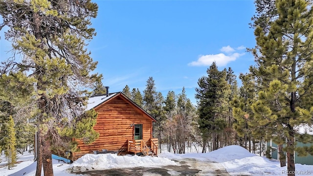 view of snow covered property