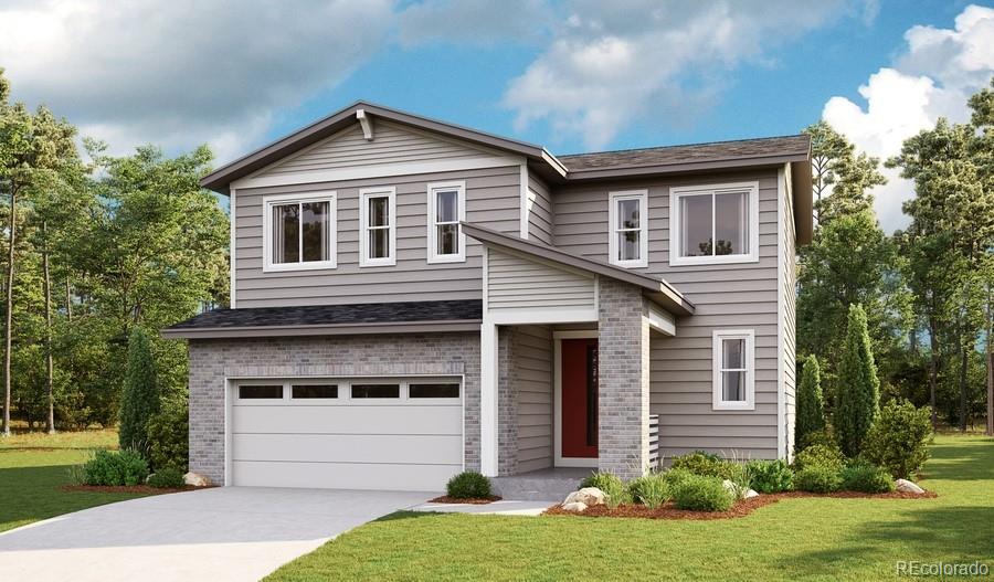 view of front of property with a front yard and a garage