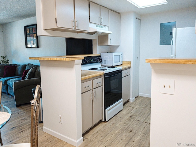 kitchen with light wood-style flooring, baseboards, white appliances, under cabinet range hood, and light countertops