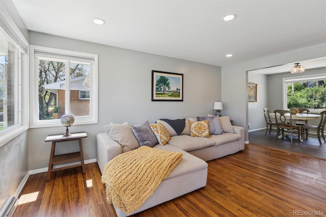 269 Beryl Way, Broomfield, CO 80020 - living room with wood finished floors, baseboards, recessed lighting, and a baseboard heating unit