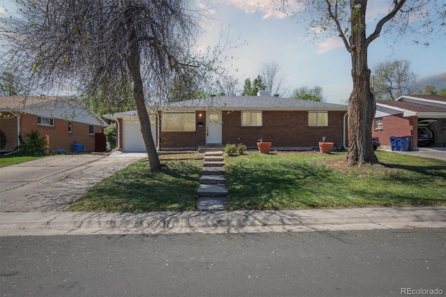 269 Beryl Way, Broomfield, CO 80020 - ranch-style home with brick siding, driveway, a garage, and a front yard