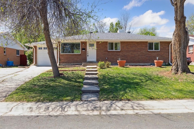 269 Beryl Way, Broomfield, CO 80020 - ranch-style house featuring brick siding, an attached garage, driveway, and a front yard